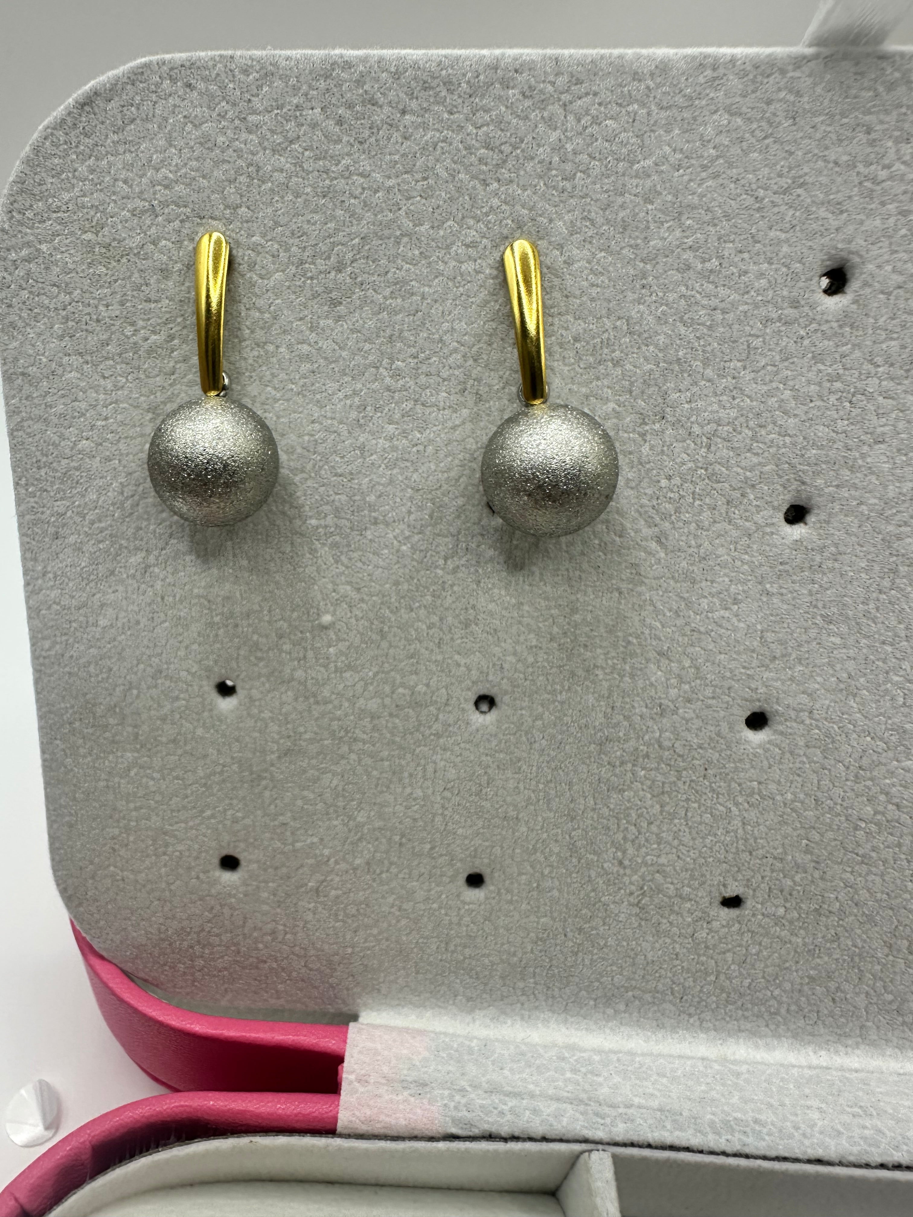 Aretes de bolita combinados