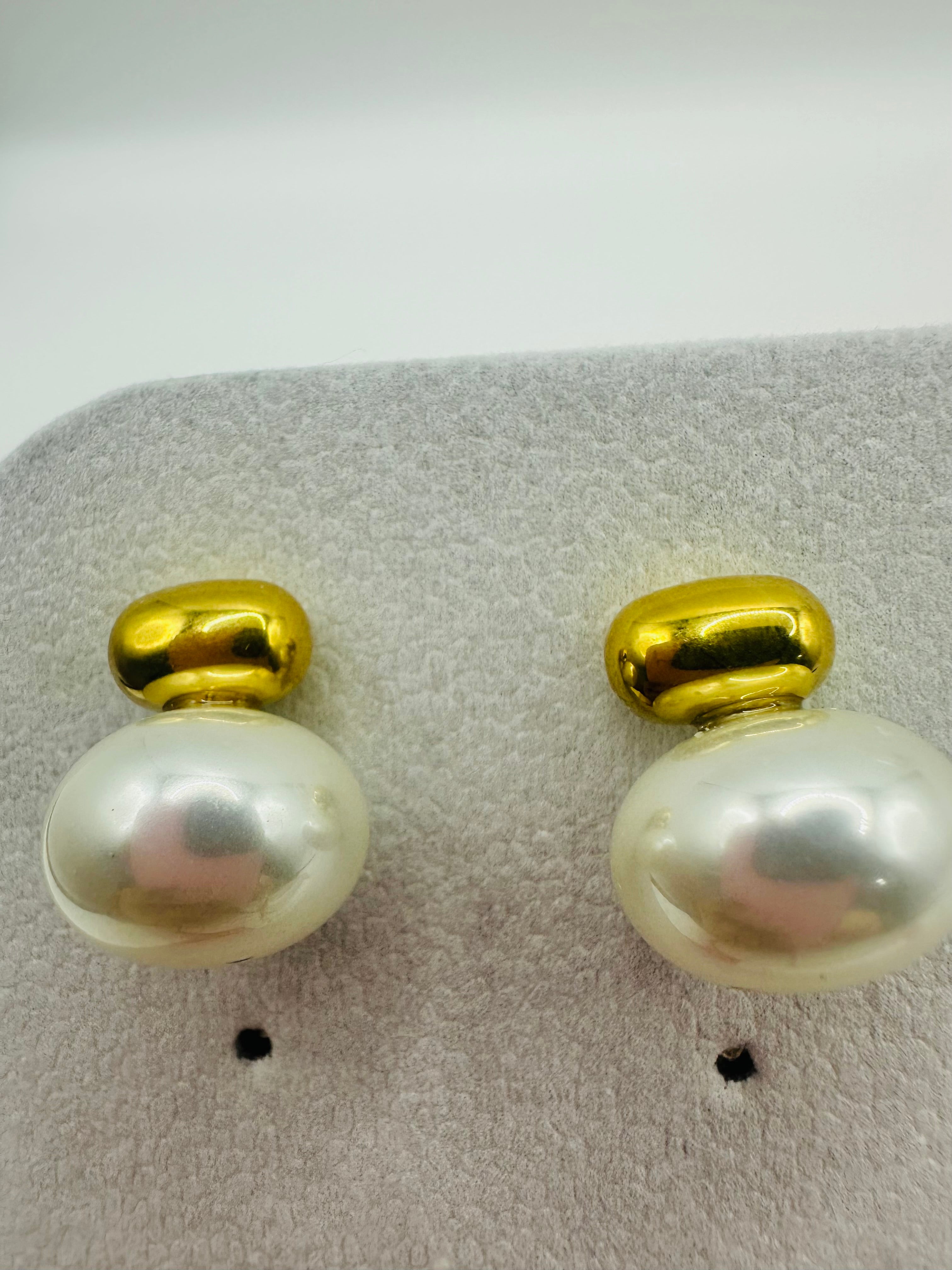 Aretes de acero con perla